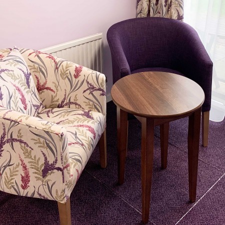 Classic Stratford tub chair for hotels, sports and social clubs, care homes and nursing homes in SMD ILIV Susanna fabric - here in lounge setting